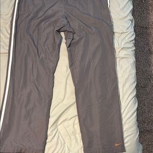 Kids grey & orange Nike track pants